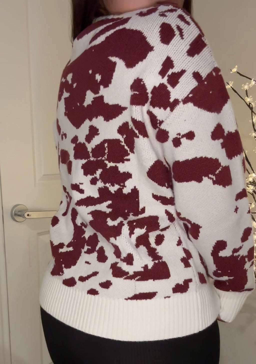 “Ella Sweater” cow pattern round neck knit